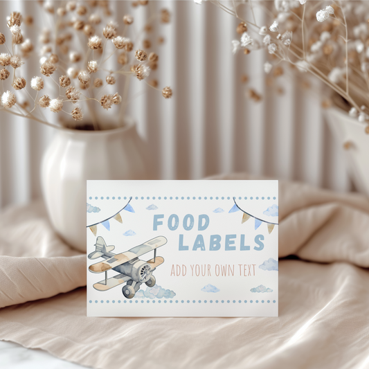 Card with airplane design and text 'Food Labels Add Your Own Text' on a neutral background.