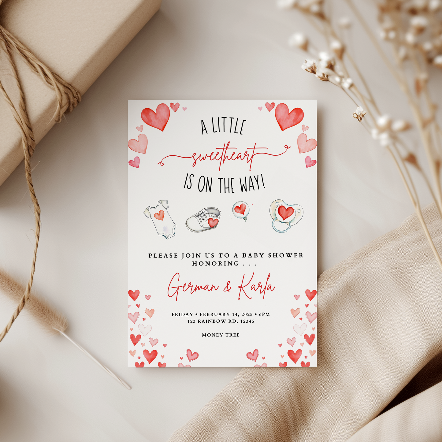 Baby shower invitation with heart designs on a neutral background