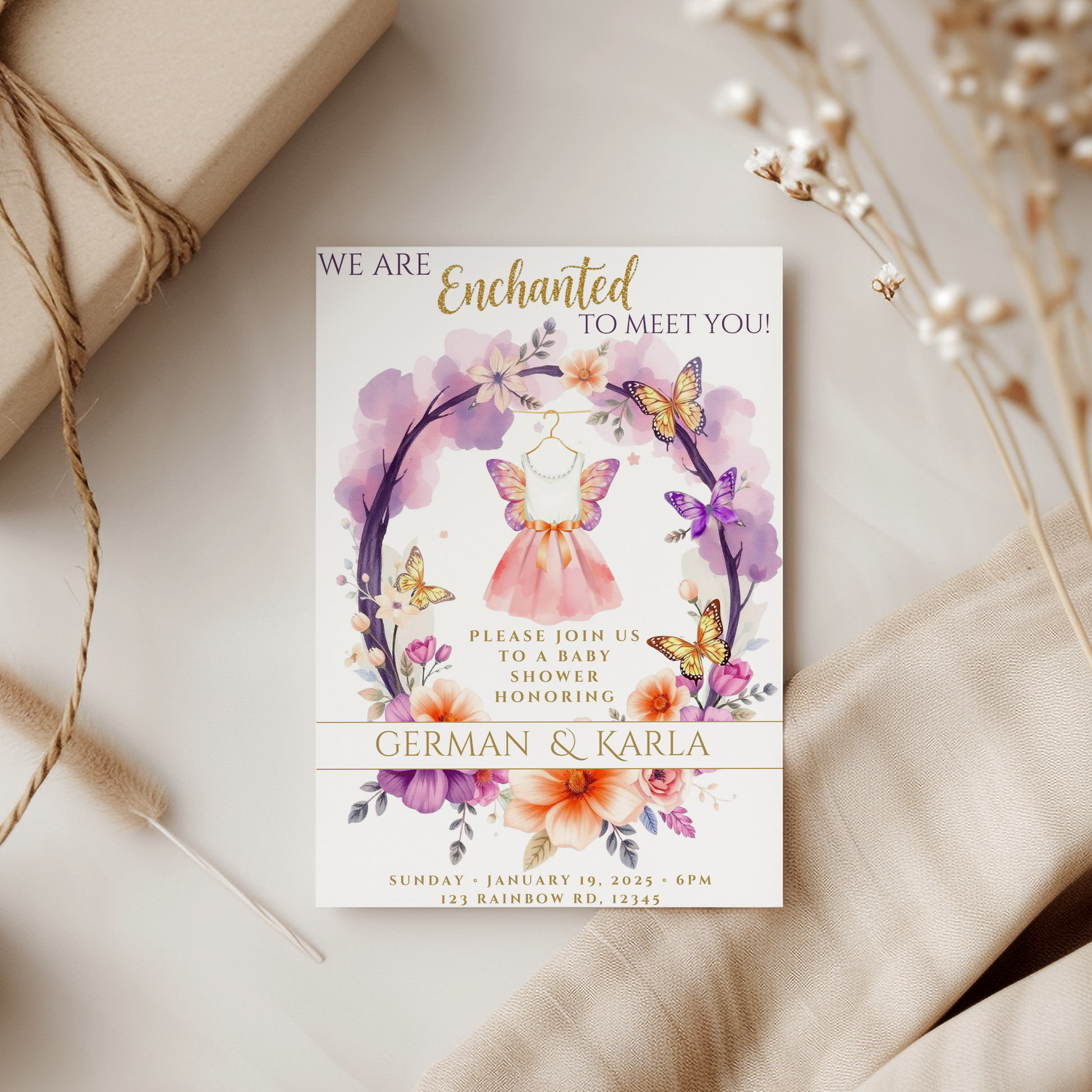 Baby shower invitation with floral and butterfly design on a neutral background
