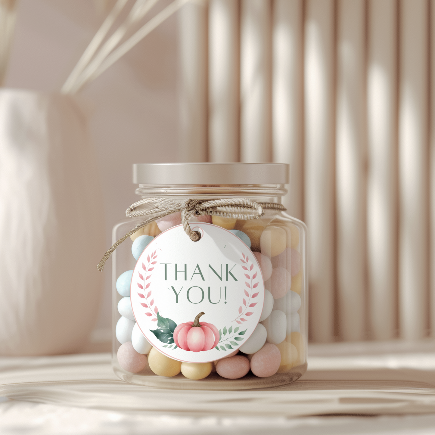 Jar of colorful candies with a 'Thank You!' tag on a neutral background