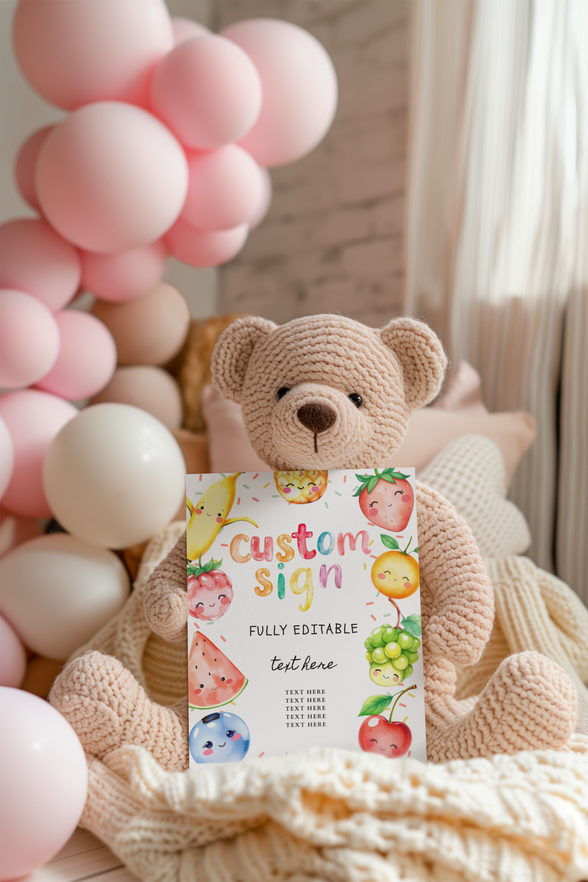 Teddy bear with a 'custom sign' card in front of pink balloons