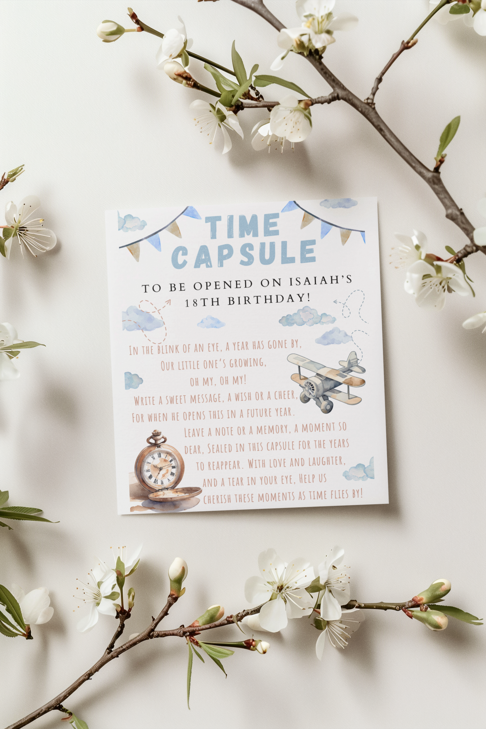 Time capsule invitation card with airplane design on a white background with floral branches.