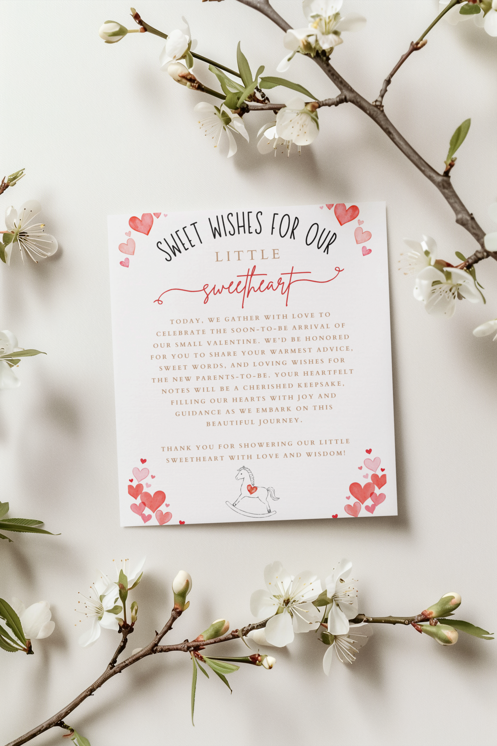 Greeting card with 'Sweet Wishes for our Little Sweetheart' text on a white background with floral branches.