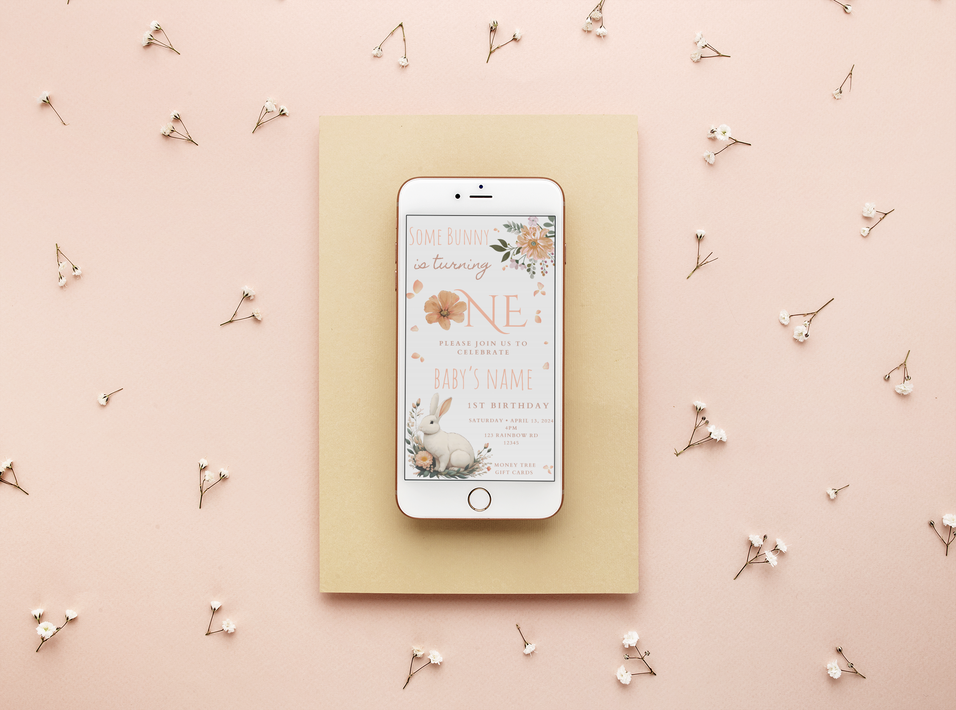 Phone with a floral design on a pink background with decorative elements