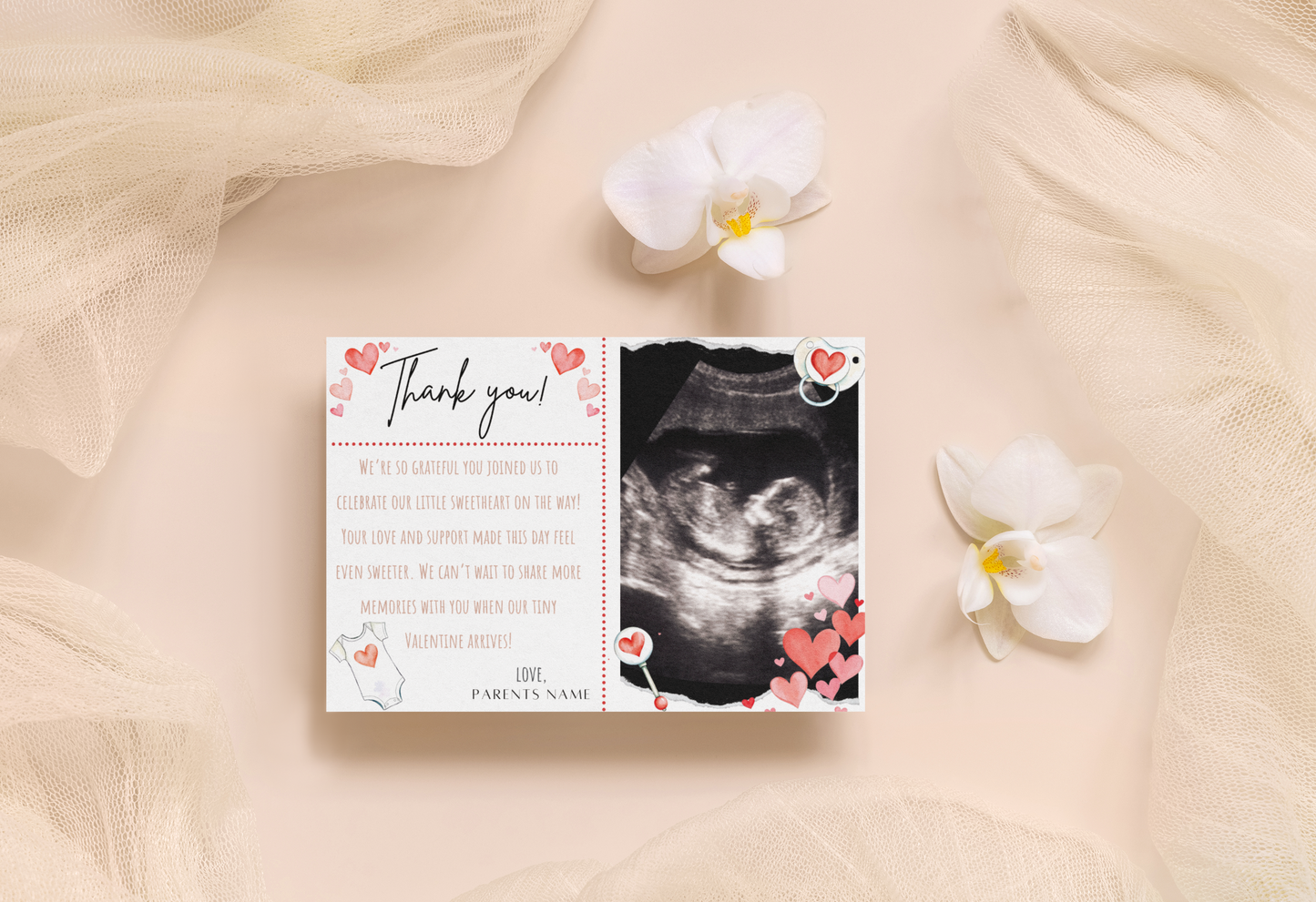 Thank you card with ultrasound photo and flowers on a soft fabric background